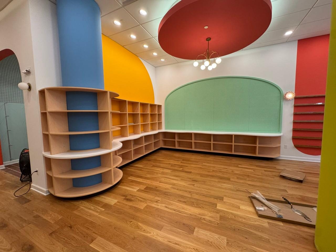 Curved cubby casework in a children’s space