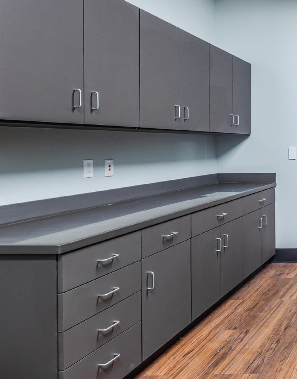 Gray laminate base cabinets with countertop